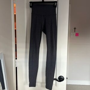 Lululemon grey leggings. Size 2. Stitching is intact.